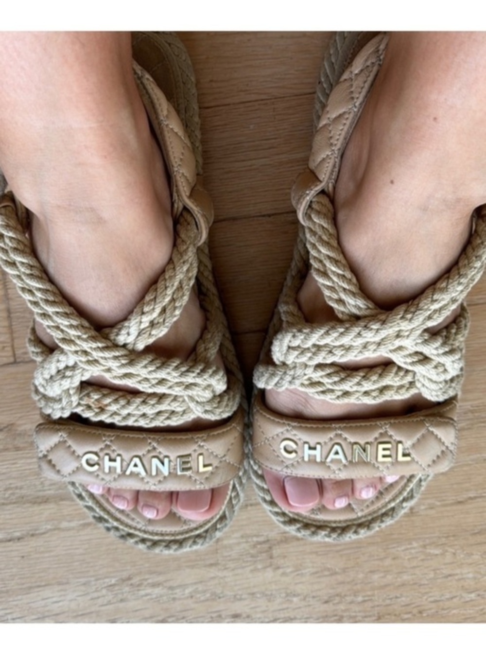 Chanel beige leather and rope quilted logo sandals.